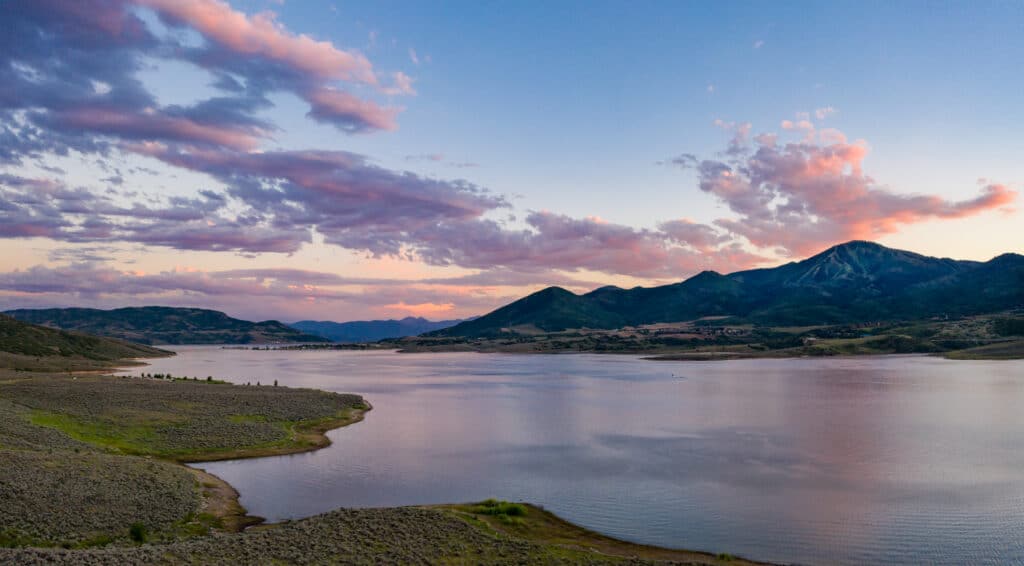 beautiful sunset view of the Jordanelle reservoir in Park City, Utah during summer